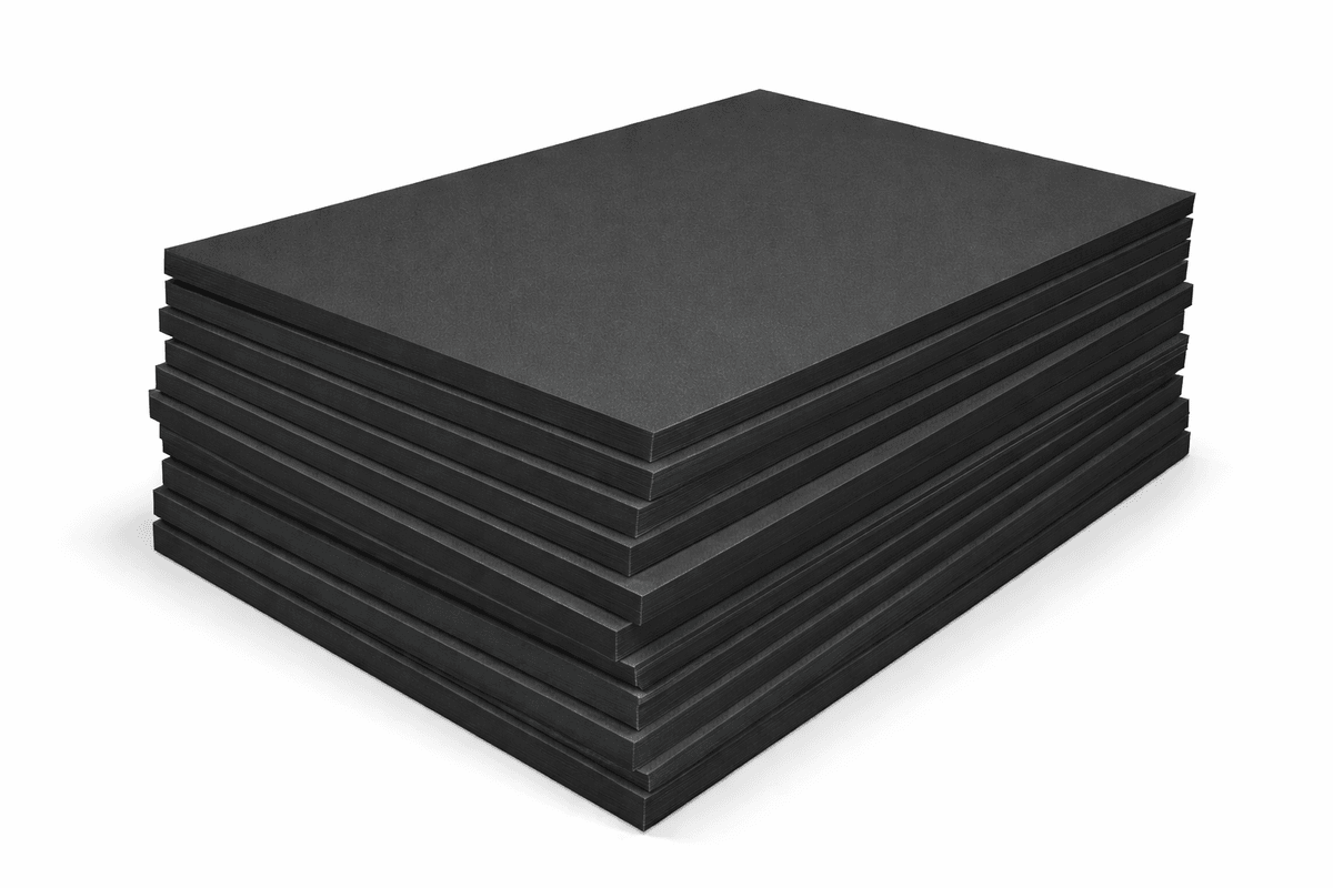 Stack of standard black foam boards with deep black surface
