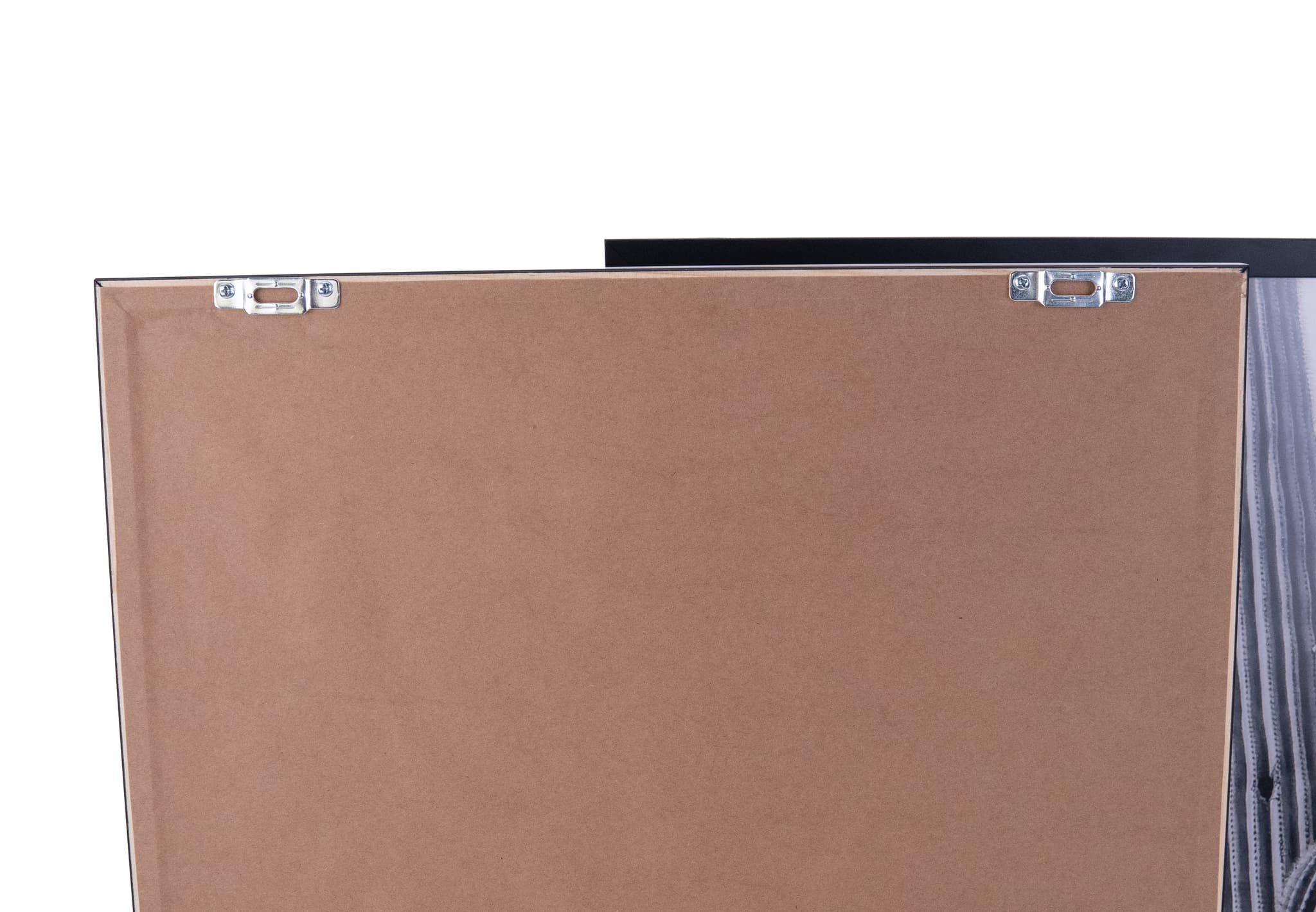 Close-up view of security T-screws and locking brackets mounted on picture frame back for anti-theft protection