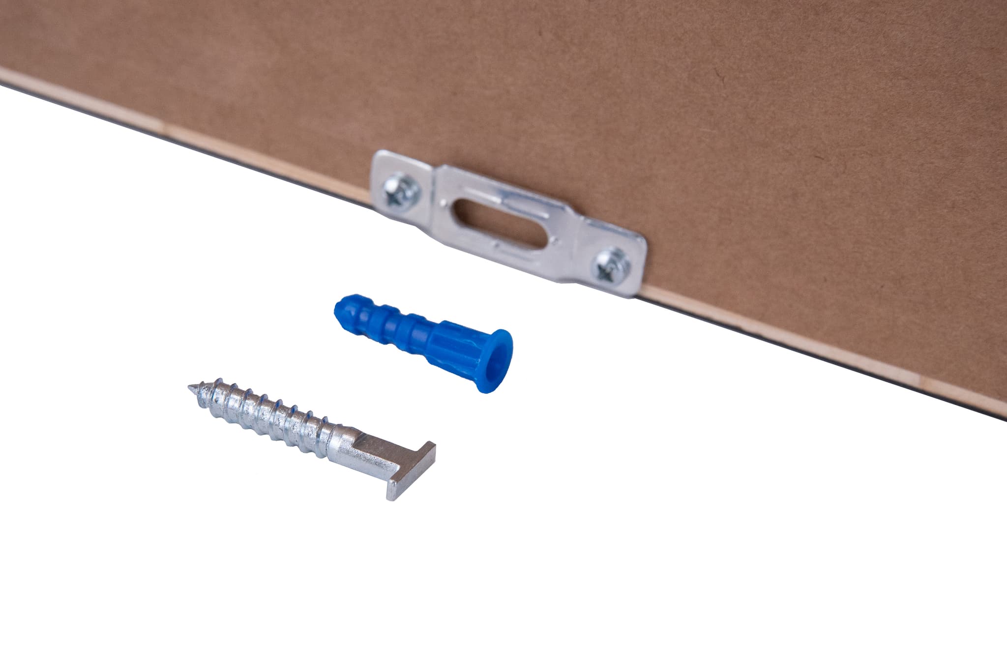 Close-up of security T-screw, wall anchor, and specialty wrench for anti-theft picture frame mounting system
