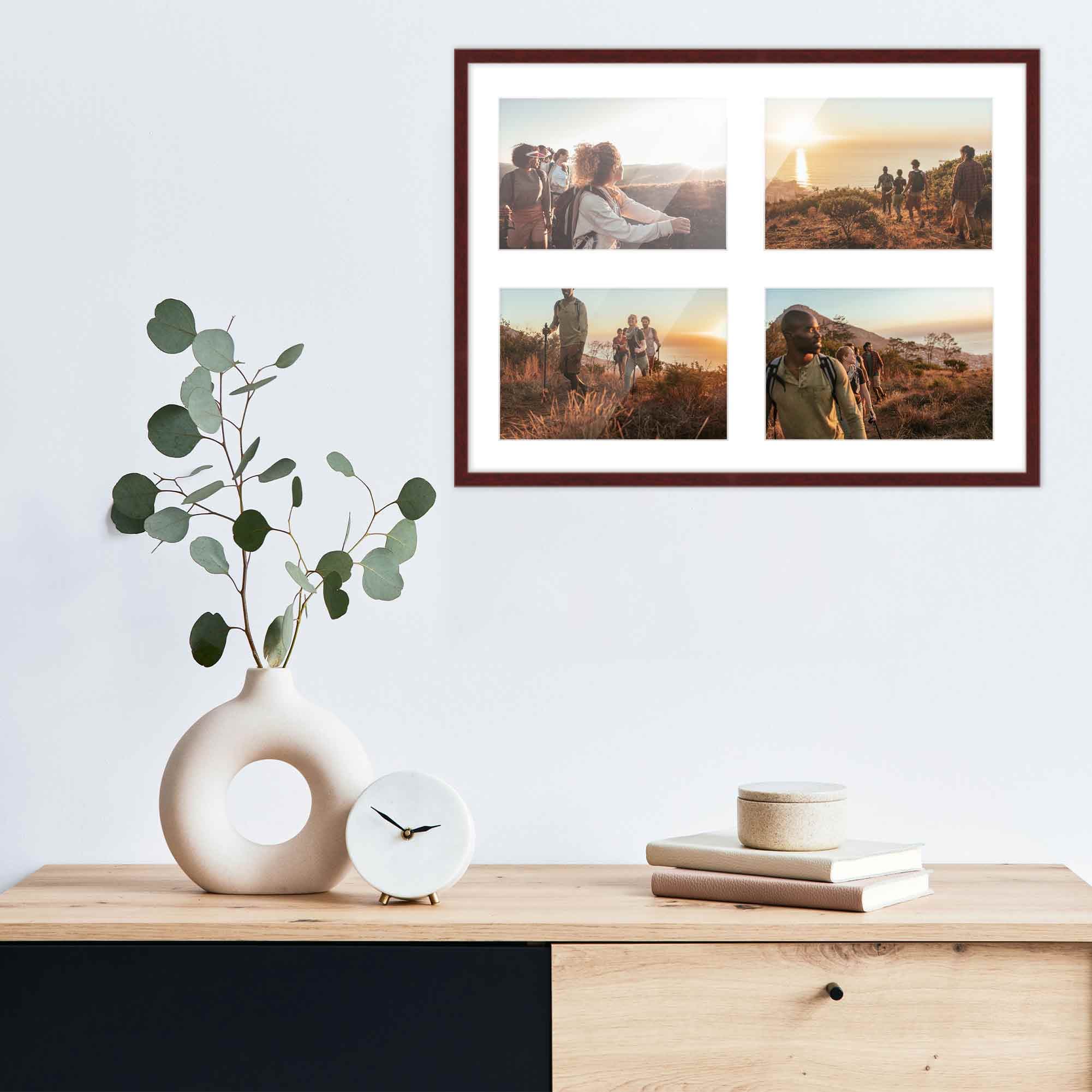 Mahogany Picture frame with white collage mat displaying national park photographs arranged above modern desk workspace