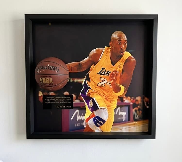 Kobe Bryant Lakers #24 action shot shadow box with a mini Spalding NBA basketball and engraved tribute plaque