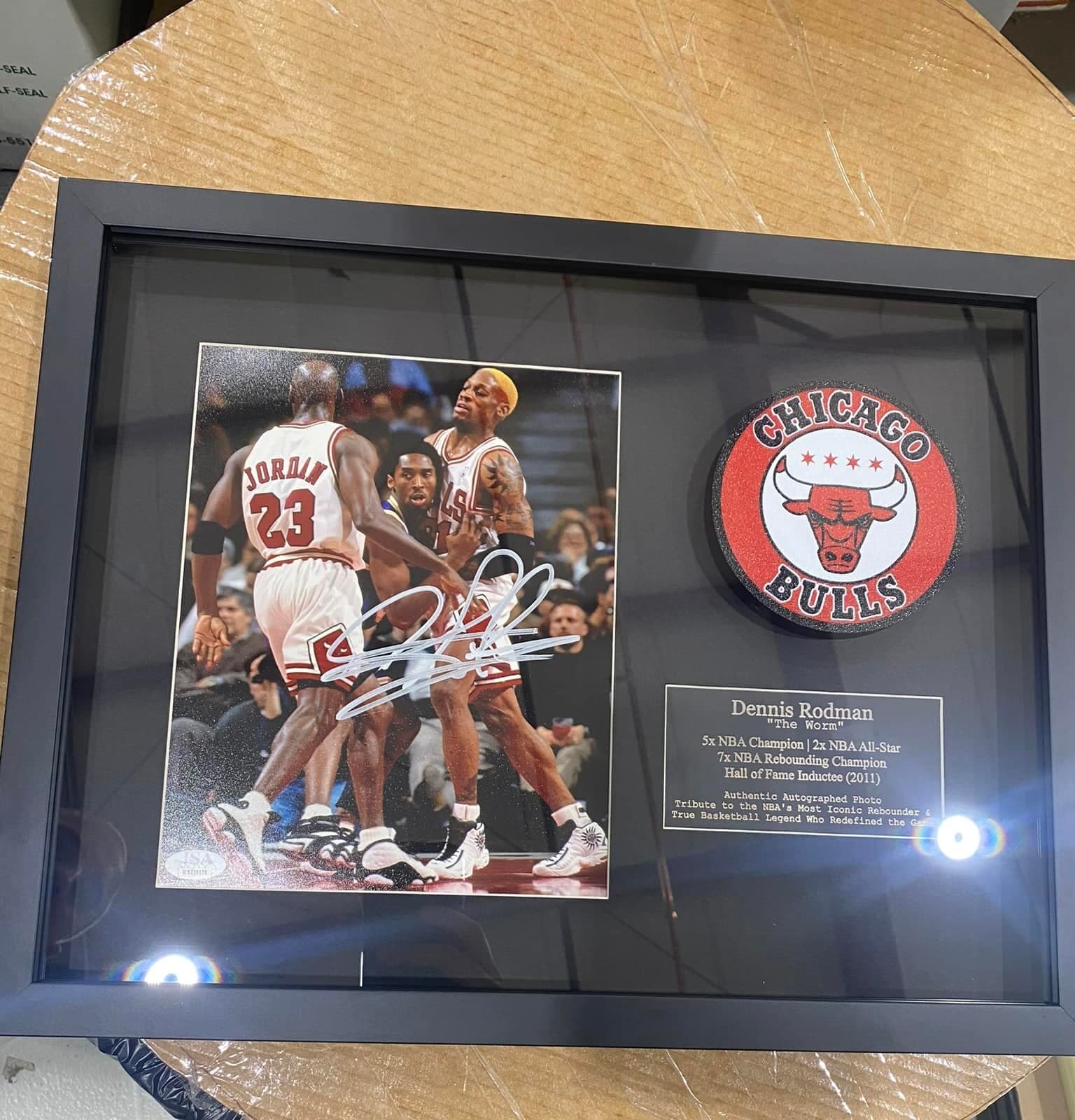 Michael Jordan and Dennis Rodman Chicago Bulls signed print framed alongside an embroidered Bulls logo patch with engraved Dennis Rodman tribute plaque