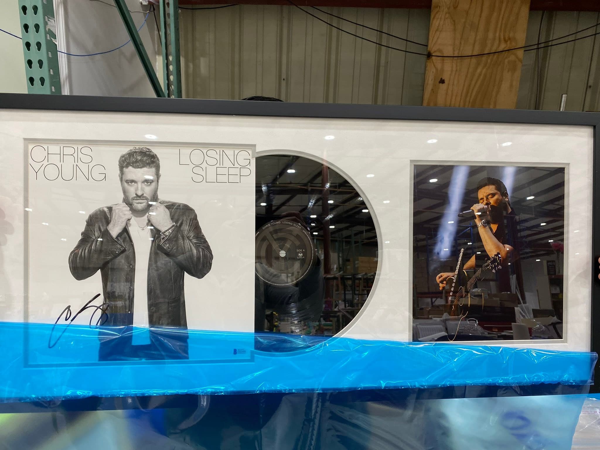 Signed Chris Young Losing Sleep LP framed with the album jacket on the left, the vinyl record at center, and a signed Chris Young photo on the right