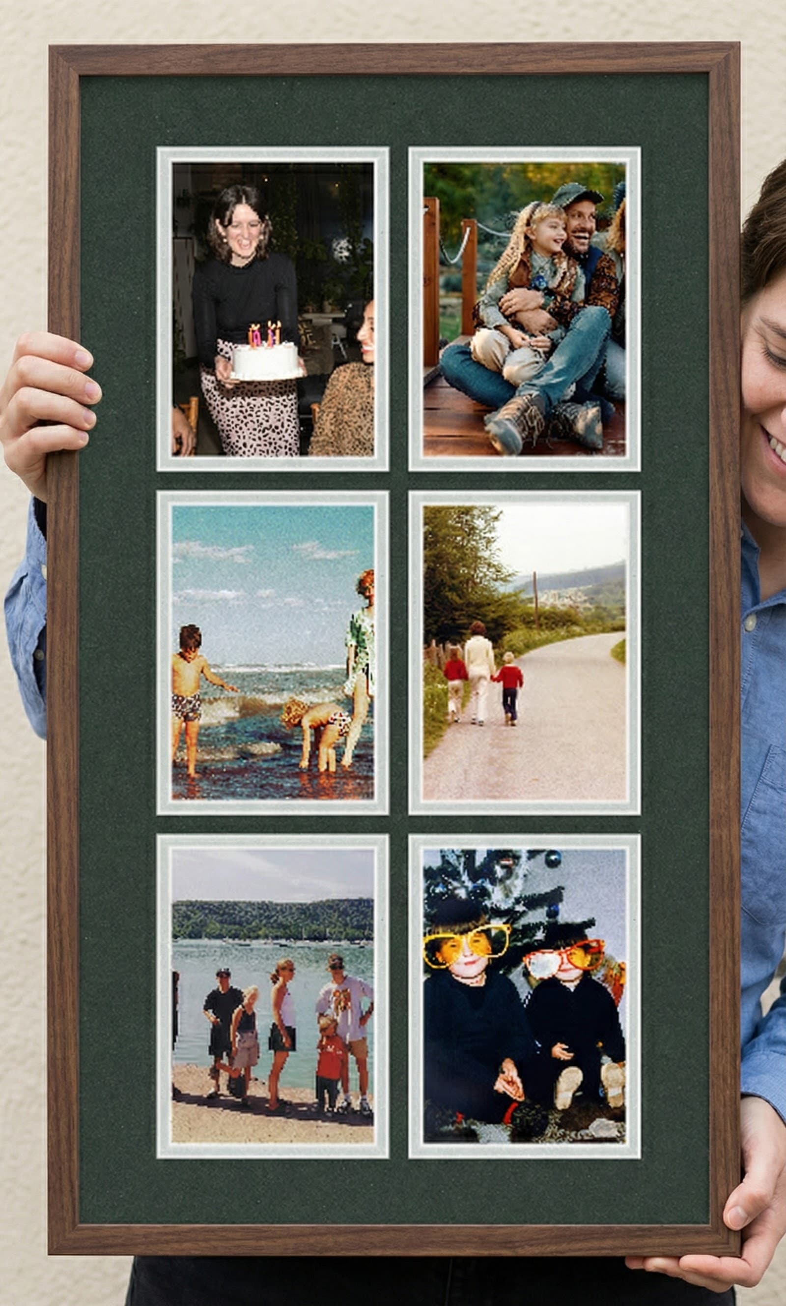 Gallery wall with custom collage frames featuring coordinated family photos