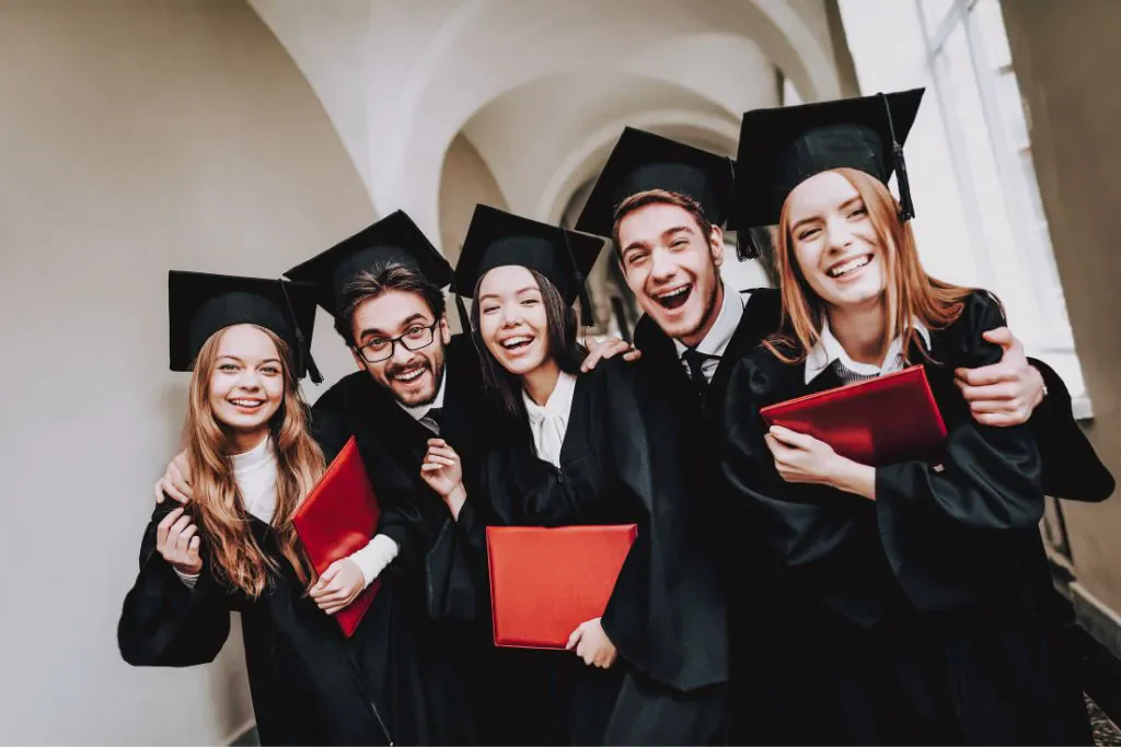 graduates with diplomas to frame