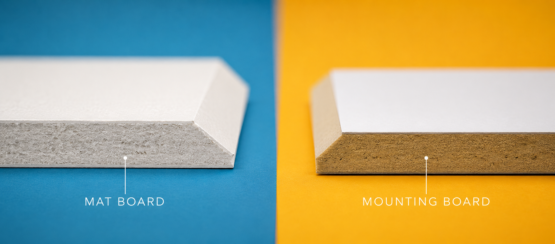 A beveled white mat board sheet stacked next to a thicker tan foam-core mounting board on a workbench